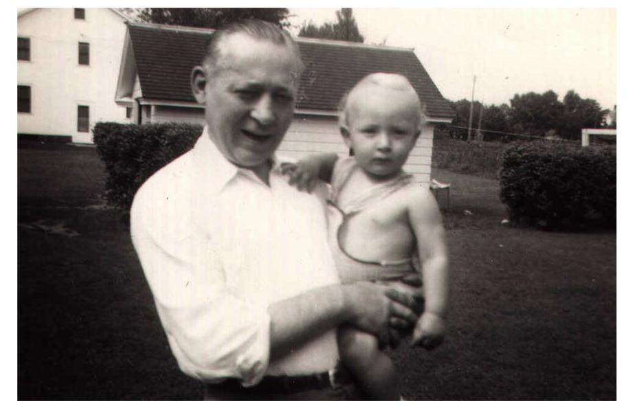 Grandpa Hodapp holding my dad, circa 1944.